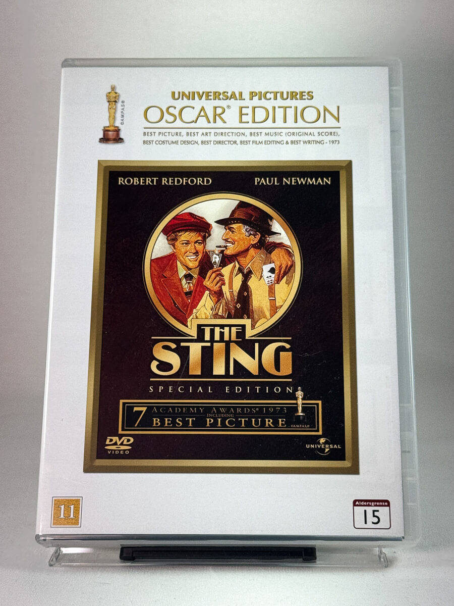 Forside av DVD-cover til The Sting, bruktfilm hos nettbutikken Brukbar Film