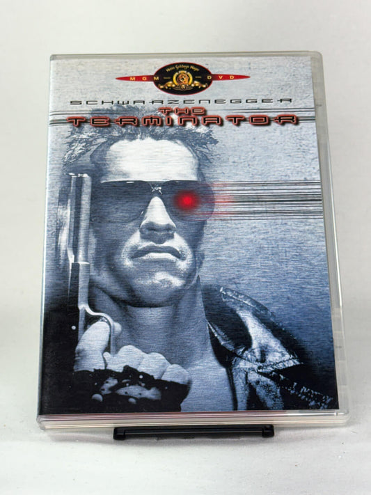 Forside av DVD-cover til The Terminator med Arnold Schwarzenegger – banebrytende sci-fi actionklassiker regissert av James Cameron, brukt DVD fra Brukbar Film