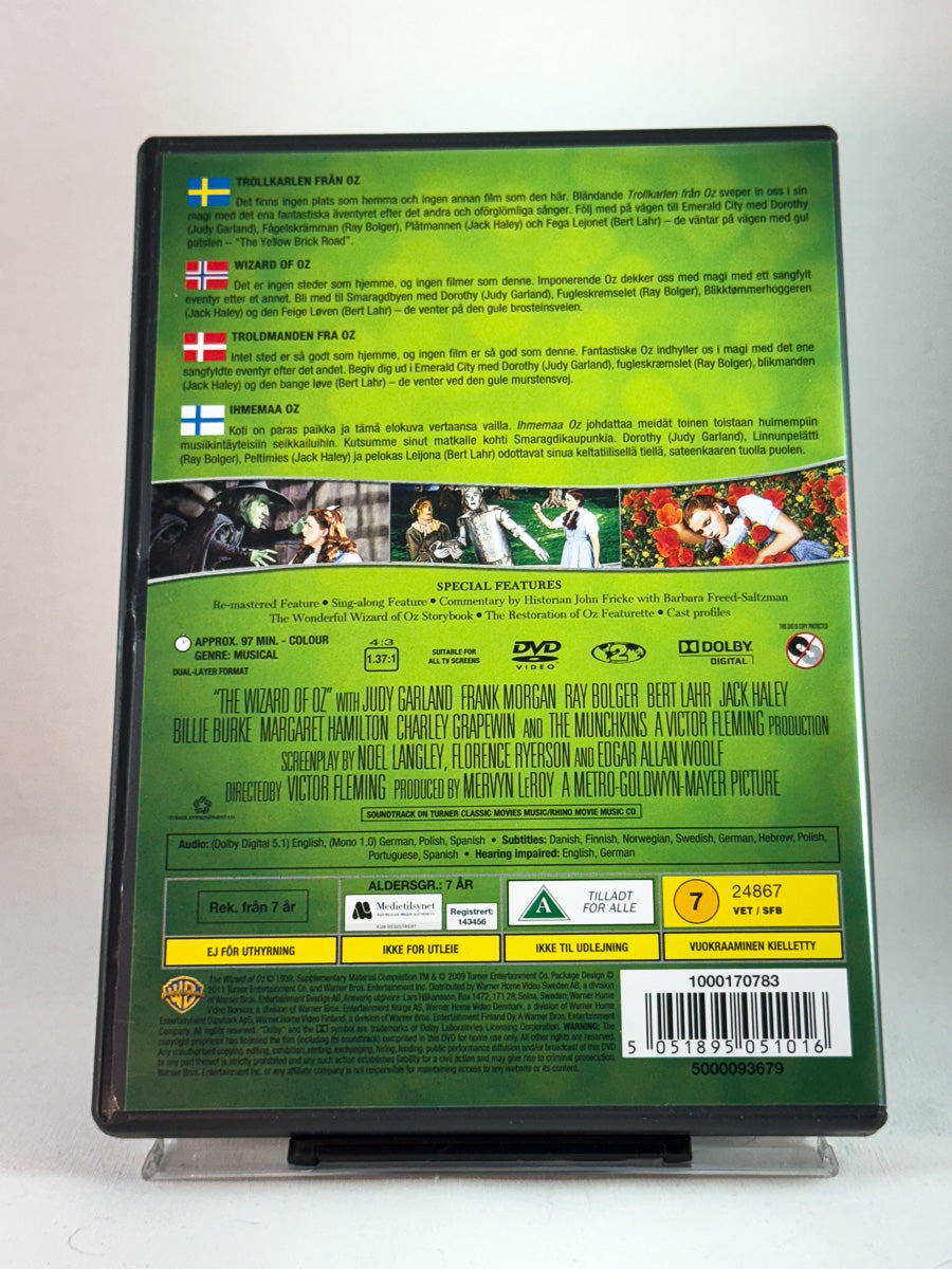 Bakside av DVD-cover til The Wizard of Oz – klassisk familie- og fantasyfilm fra 30-tallet med ikoniske karakterer, brukt original-DVD hos Brukbar Film.