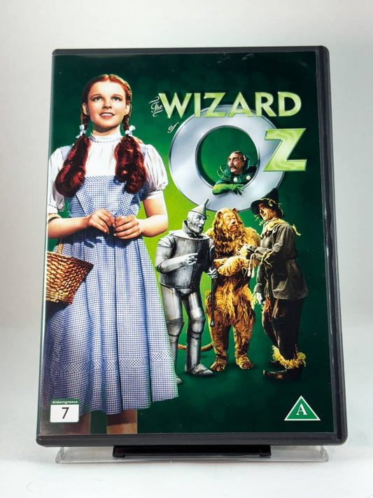 Forside av DVD-cover til The Wizard of Oz – filmklassiker med Judy Garland som Dorothy i et tidløst eventyr fra MGM, brukt DVD hos Brukbar Film.
