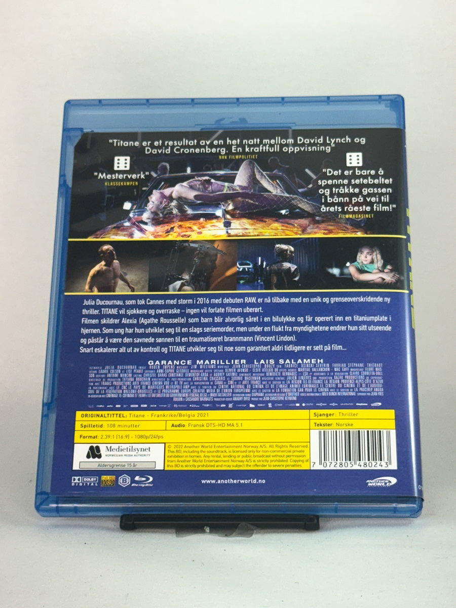 Bakside av filmcover til Titane – brukt Blu-ray-film fra Julia Ducournau, kjøp hos Brukbar Film
