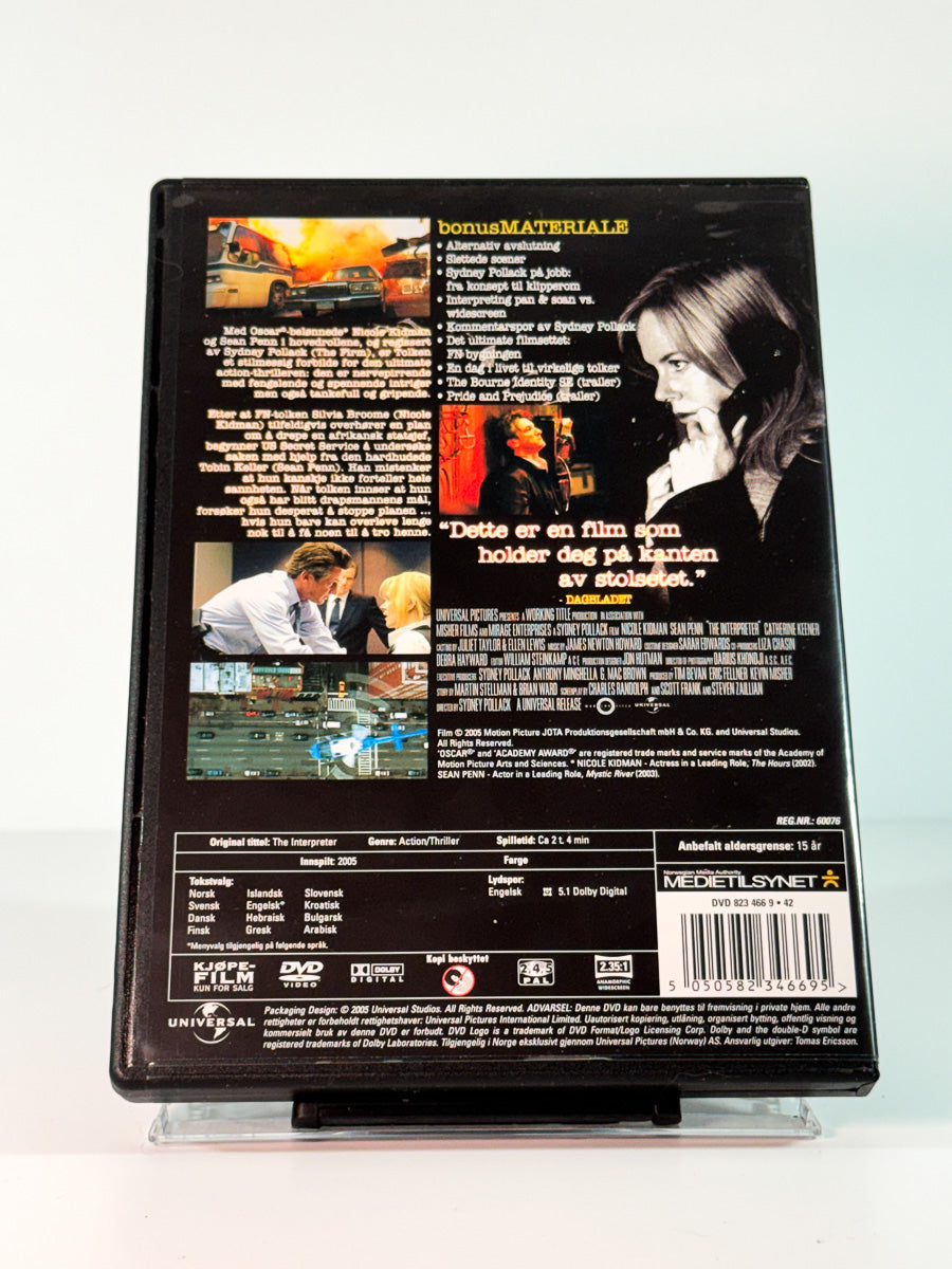 Bakside av cover til Tolken, brukt original DVD hos Brukbar Film