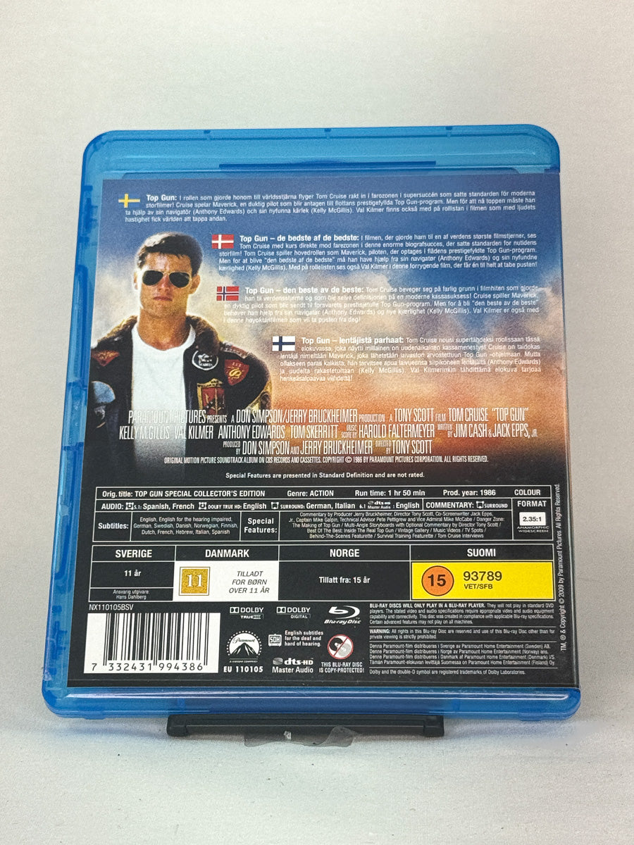 Bakside av Blu-ray-cover til Top Gun – spesialutgave for samlere, klassisk actiondrama på Blu-ray hos Brukbar Film.
