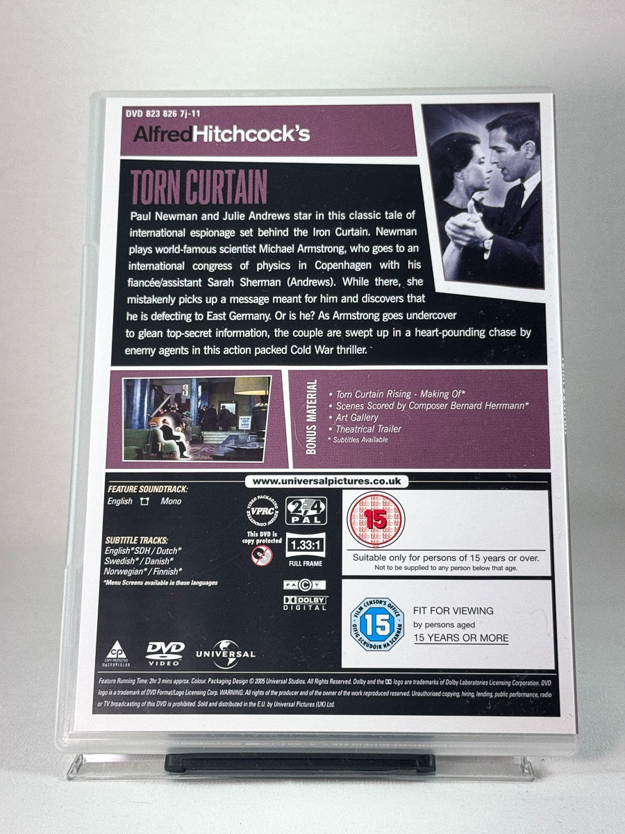 Bakside av DVD-cover for Torn Curtain – spenning og dobbeltspill i klassisk Hitchcock-stil, brukt DVD hos Brukbar Film.