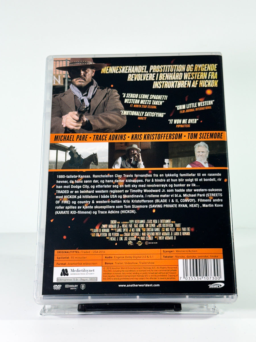 Bakside av cover til Traded, brukt original DVD hos Brukbar Film