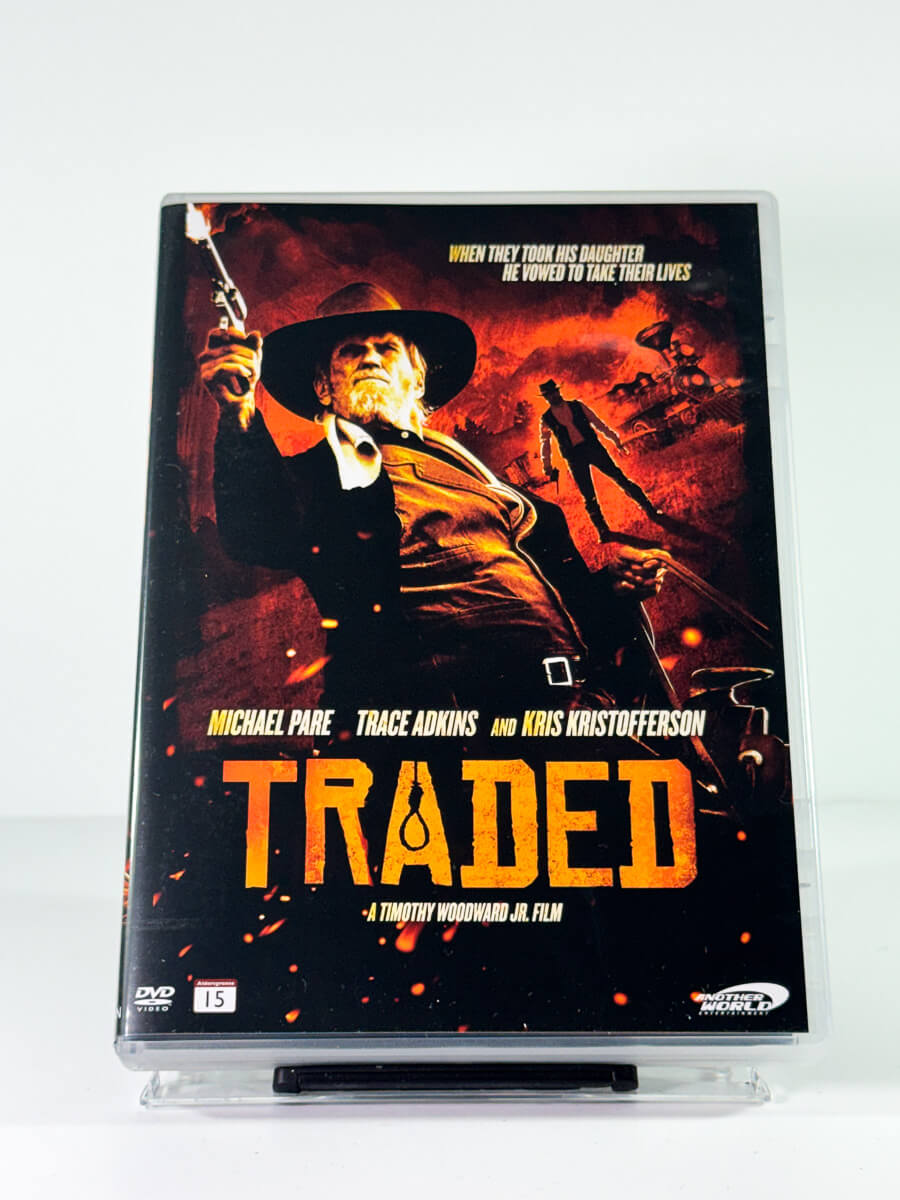 Forside av cover til Traded, bruktfilm hos nettbutikken Brukbar Film
