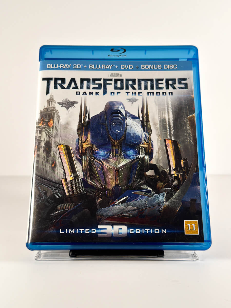 Forside av cover til Transformers: Dark of the Moon på Blu-ray 3D + Blu-ray + DVD