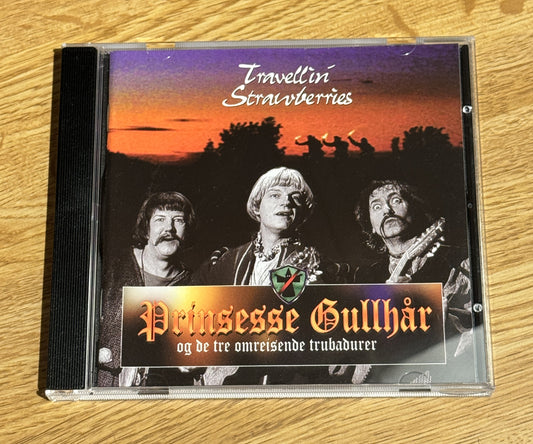 Forside av cover til Travellin Strawberries Prinsesse Gullhår og de tre omreisende trubadurer, norsk musikkutgivelse