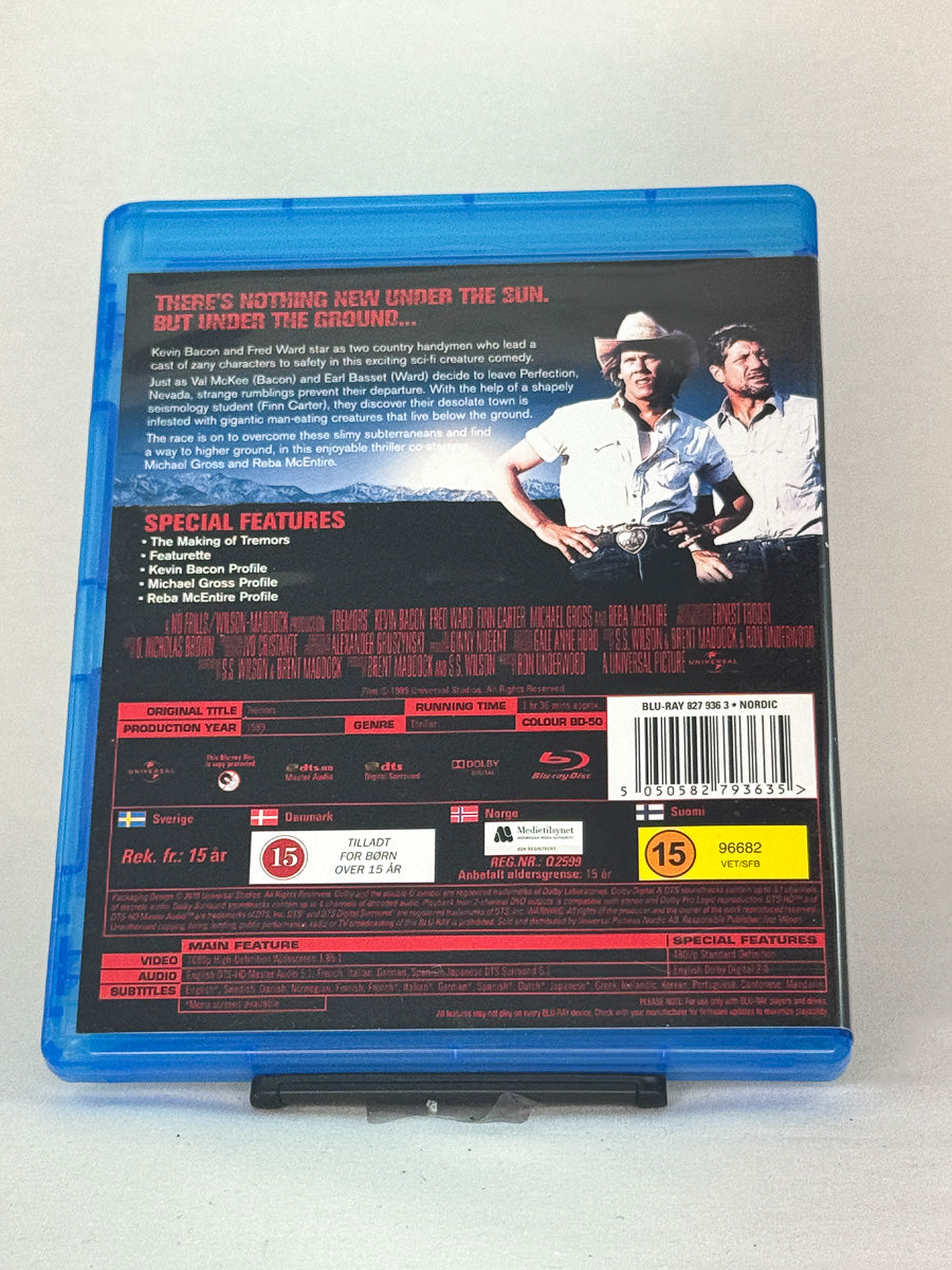 Bakside av Blu-ray-cover til Tremors – informasjon om monsterklassikeren på Blu-ray, brukt film fra Brukbar Film