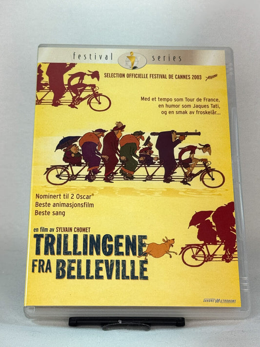 Forside av DVD-cover til Trillingene fra Belleville – Oscar-nominert animasjonsfilm av Sylvain Chomet med unik stil og fransk humor, brukt film på DVD hos Brukbar Film.