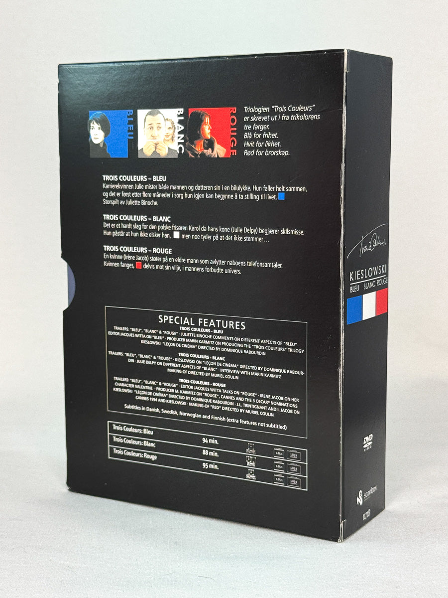 DVD-boksen Trois Couleurs: Blå / Hvit / Rød – komplett samling av Kieslowskis trilogi, brukt originalfilm fra Brukbar Film