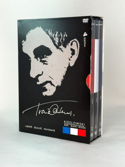 DVD-boksen Trois Couleurs: Blå / Hvit / Rød – klassisk filmtrilogi av Krzysztof Kieslowski, brukt DVD tilgjengelig hos Brukbar Film
