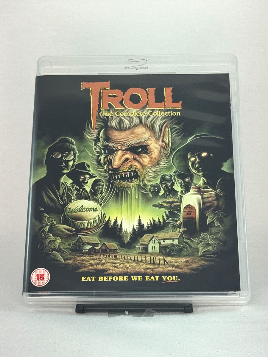 Forside av Blu-ray-cover for Troll: The Complete Collection – kultskrekk fra 80- og 90-tallet i komplett samleboks, brukt Blu-ray hos Brukbar Film.