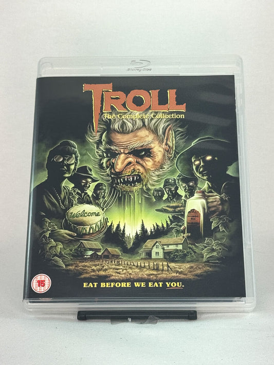 Forside av Blu-ray-cover for Troll: The Complete Collection – kultskrekk fra 80- og 90-tallet i komplett samleboks, brukt Blu-ray hos Brukbar Film.