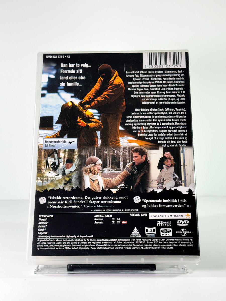 Bakside av cover til trusselen, brukt DVD hos Brukbar Film