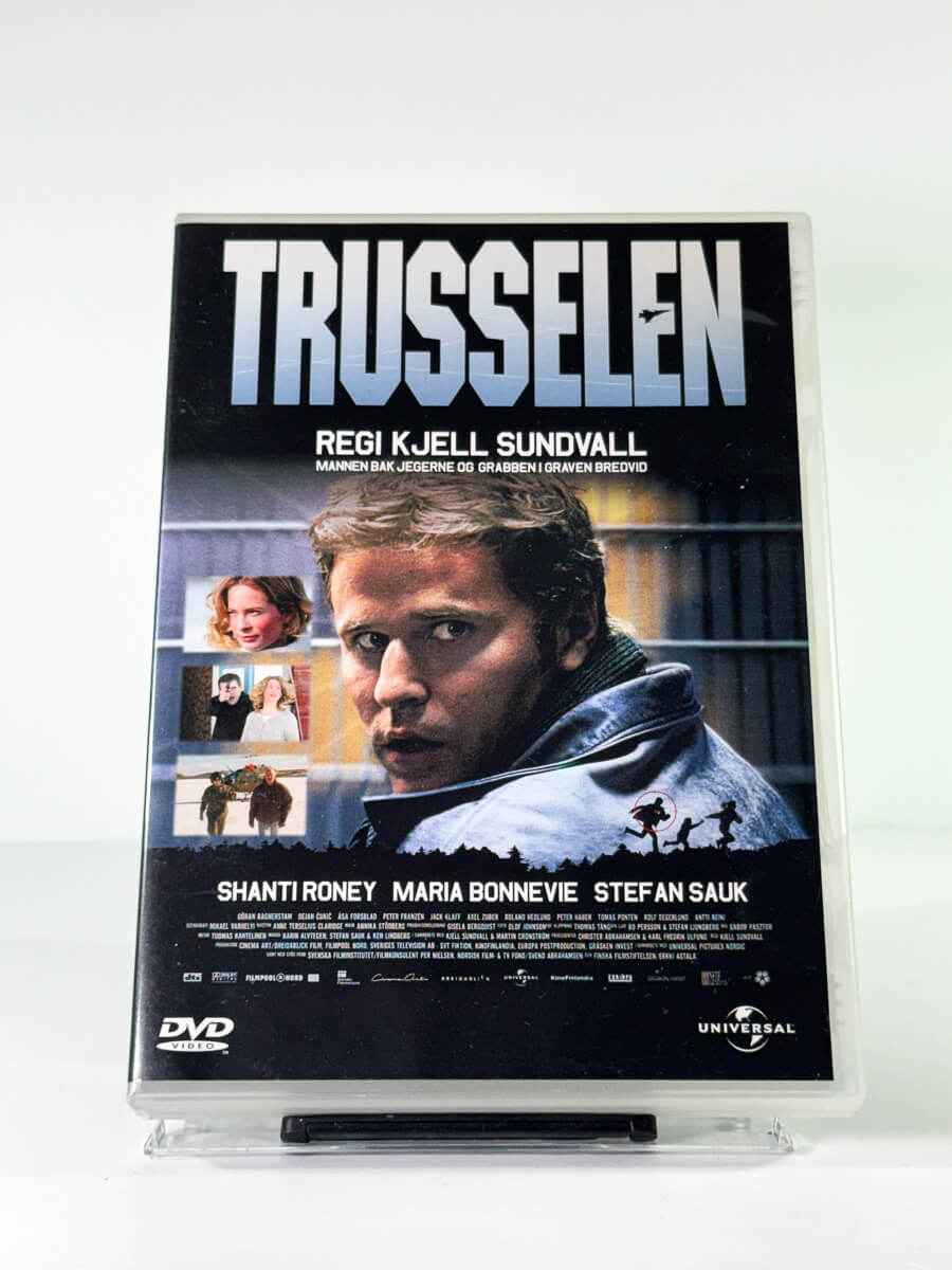 Forside av cover til trusselen, bruktfilm hos nettbutikken Brukbar Film