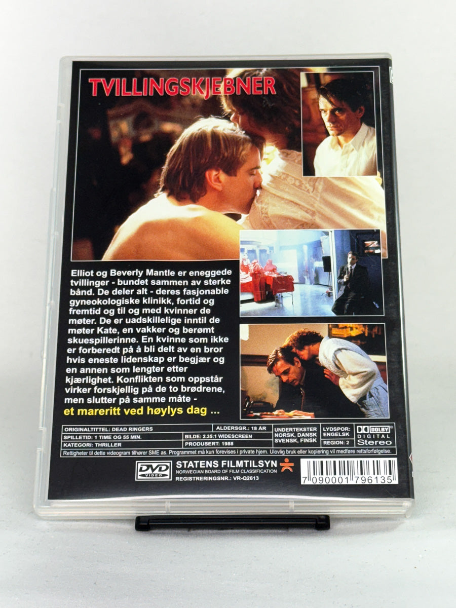 Bakside av DVD-cover til Tvillingskjebner (Dead Ringers) – brukt DVD-film regissert av David Cronenberg hos Brukbar Film