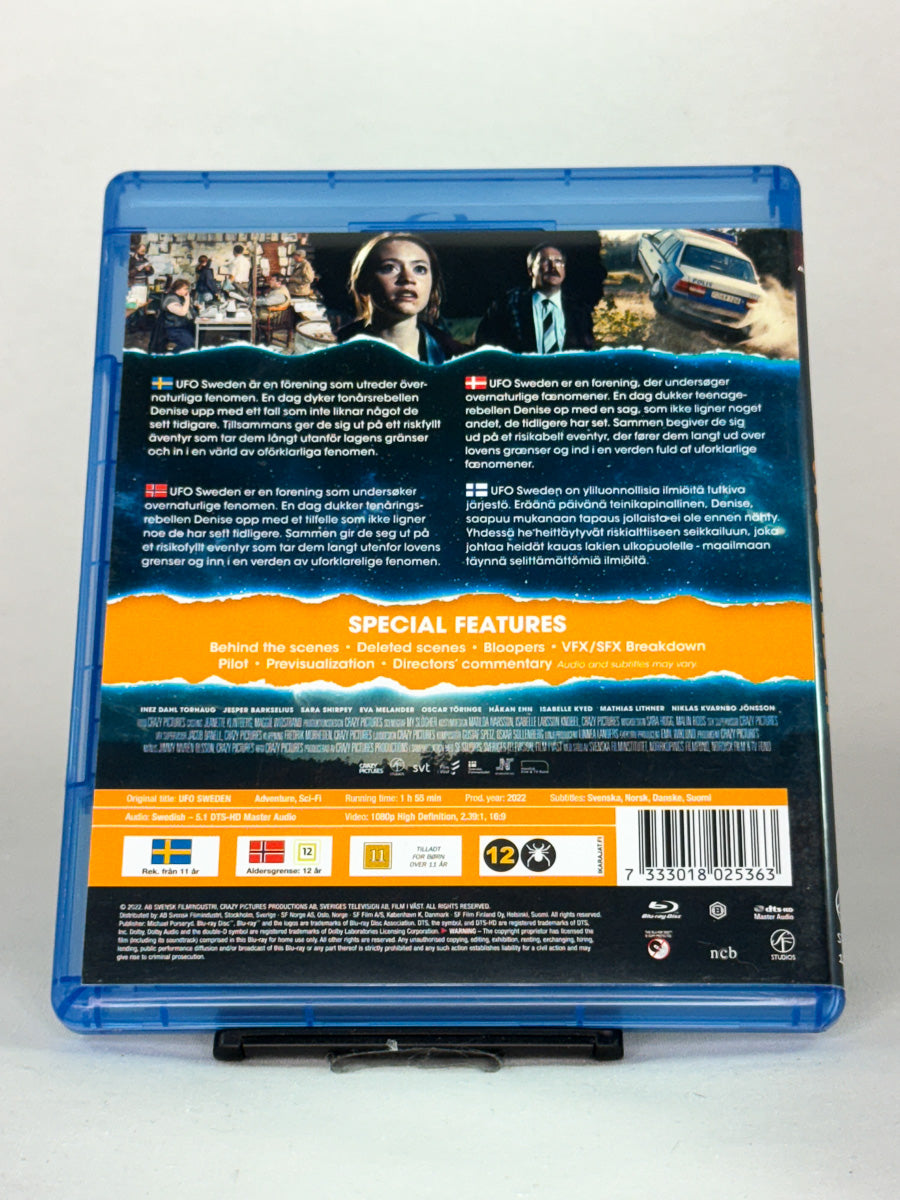 Bakside av Blu-ray-cover til UFO Sweden – en visuelt imponerende og engasjerende filmopplevelse for sci-fi-fans, original brukt Blu-ray-utgave hos Brukbar Film.