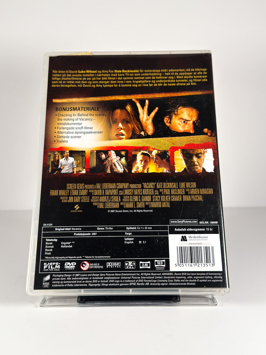 Bakside av cover til Vacancy på DVD