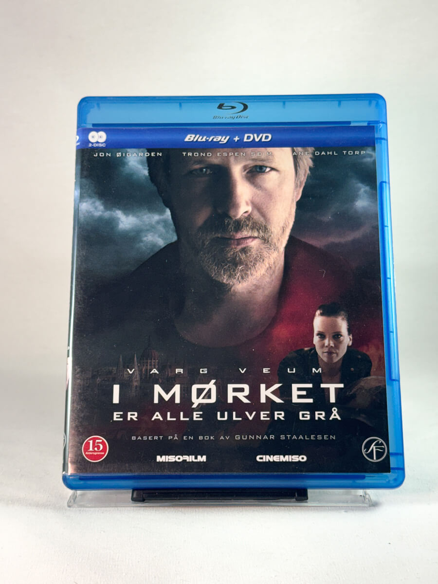 Forside av cover til Varg Veum – I mørket er alle ulver grå, brukt original Blu-ray hos Brukbar Film