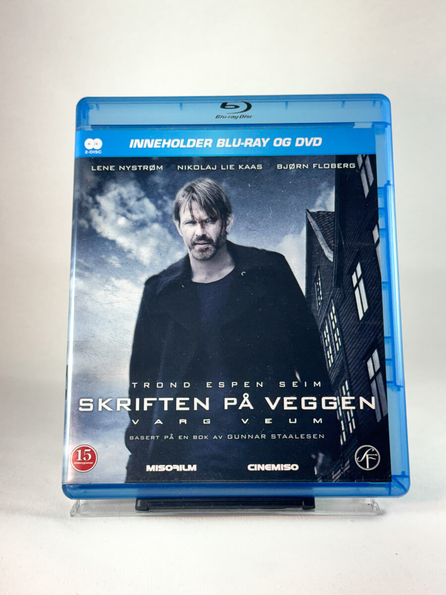 Forside av cover til Varg Veum – Skriften på veggen, brukt Blu-ray hos Brukbar Film