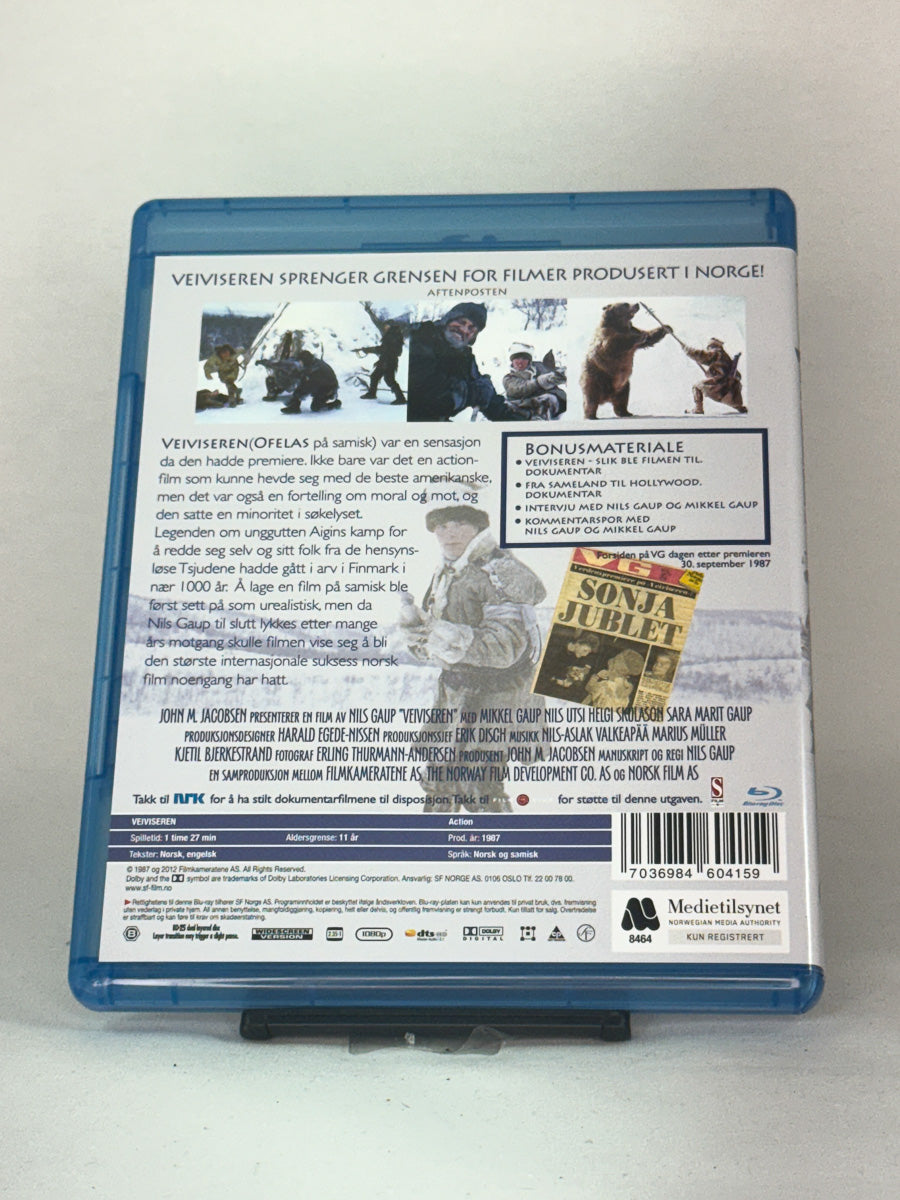 Bakside av Blu-ray-cover for filmen Veiviseren – brukt originalfilm på Blu-ray, tilgjengelig hos Brukbar Film