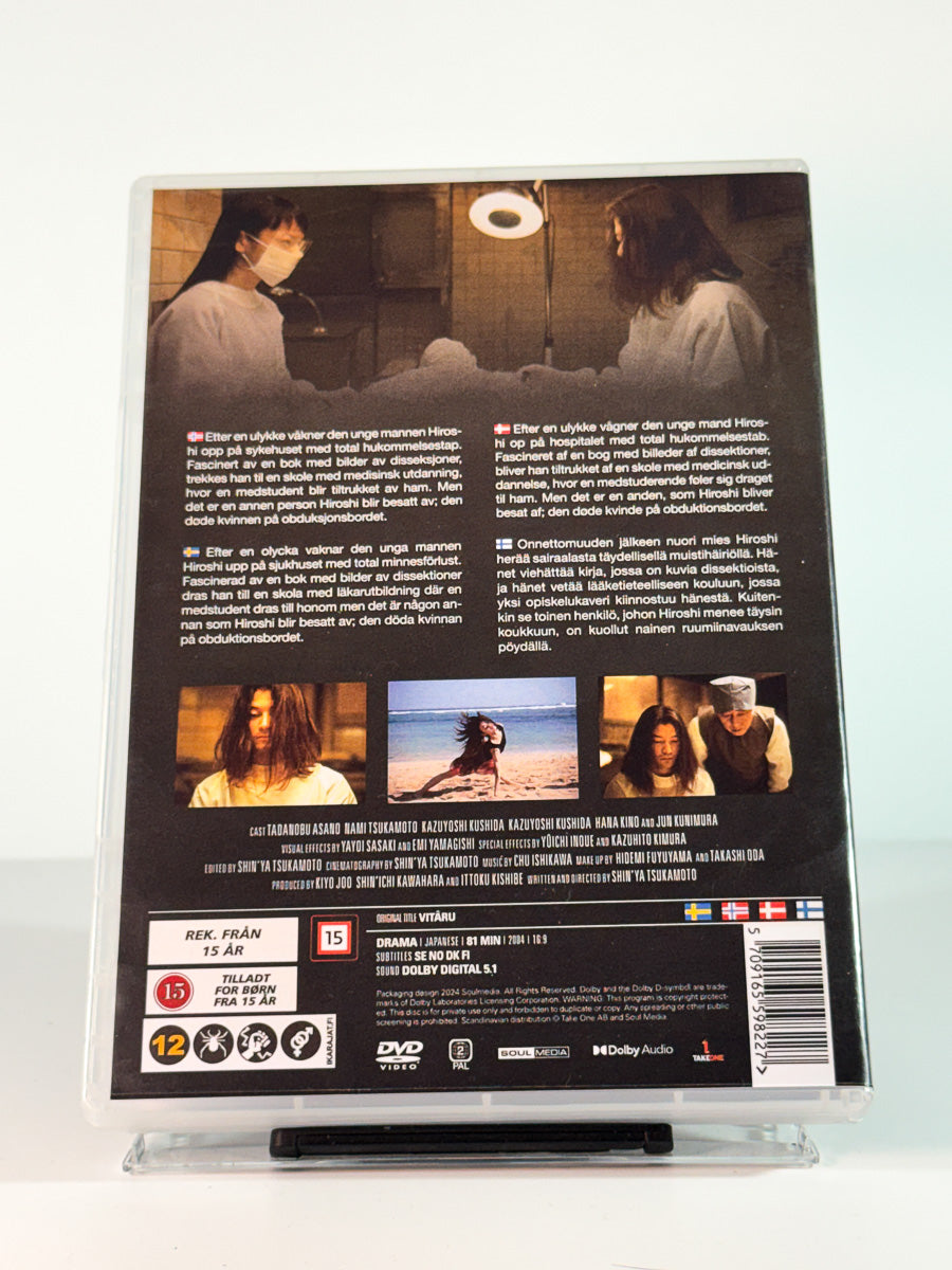 Bakside av cover til Vital, bruktfilm på DVD hos Brukbar Film