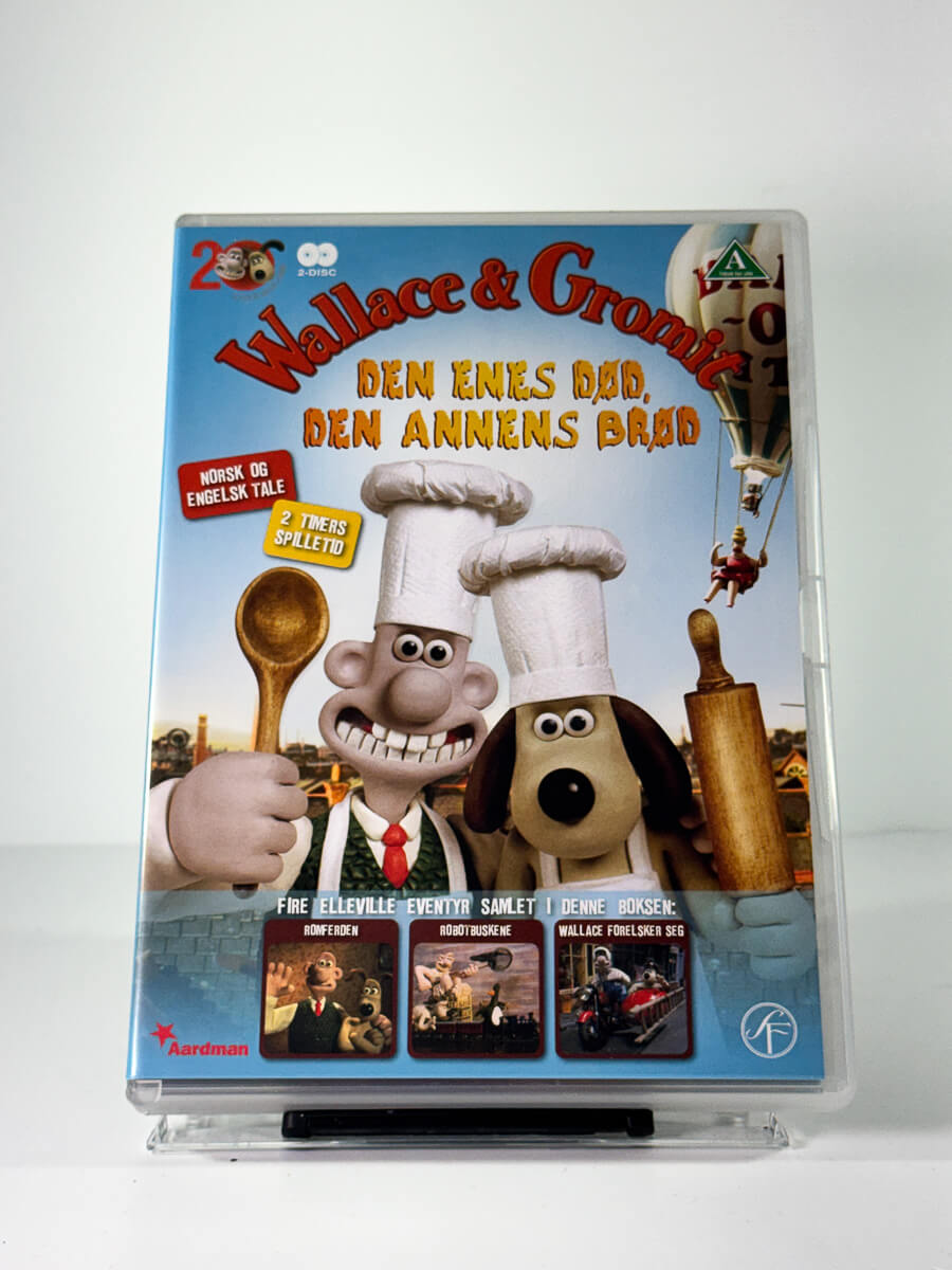 Forside av cover til wallace and gromit den enes dod den annens brod, bruktfilm hos nettbutikken Brukbar Film