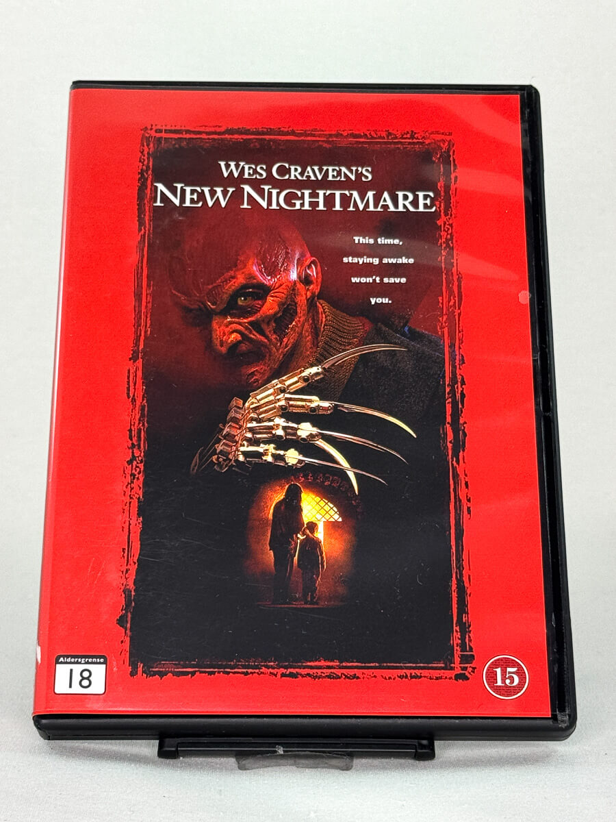 Forside av DVD-cover til Wes Craven’s New Nightmare, bruktfilm hos nettbutikken Brukbar Film