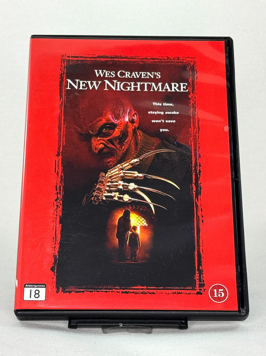 Forside av DVD-cover til Wes Craven’s New Nightmare, bruktfilm hos nettbutikken Brukbar Film
