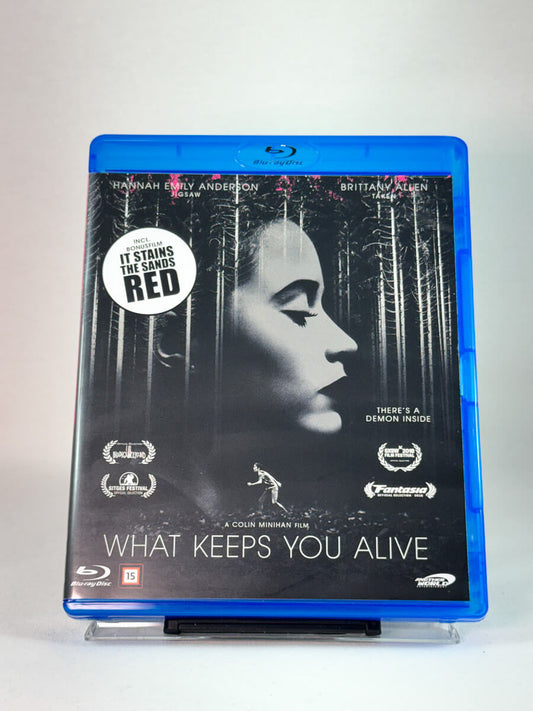 Forside av Blu-ray-cover til What Keeps You Alive, bruktfilm hos nettbutikken Brukbar Film